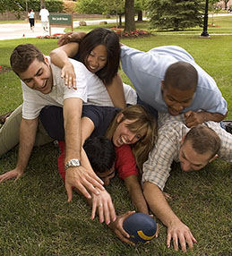 college students playing football