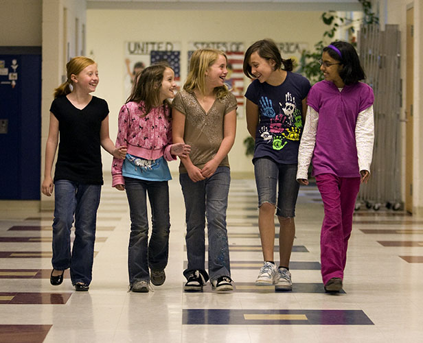 elementary school girls in hallway