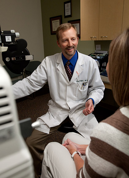 eye doctor with patient, Ann Arbor photography