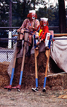 clowns on stilts