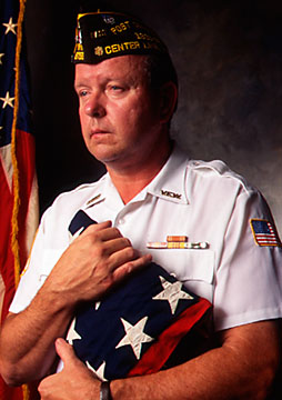 veteran with flag